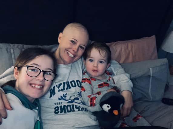 Cancer survivor Samantha Currie, 42, from Menstrie in Stirlingshire, with her children Emma and Tom