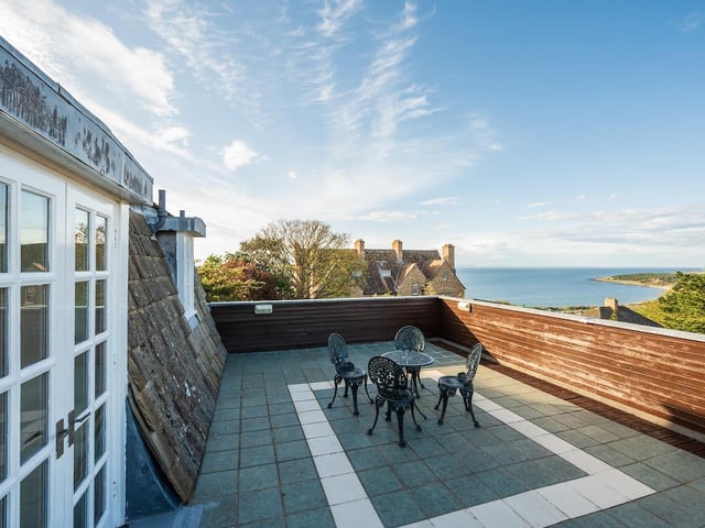 Upstairs, the ensuite principal bedroom has access to a large roof terrace.