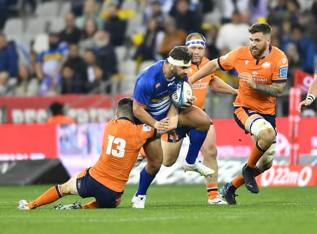 Edinburgh's Mark Bennett tackles JJ Kotze of the Stormers during the United Rugby Championship quarter-final in Cape Town. (Photo by Ashley Vlotman/Gallo Images/Getty Images)