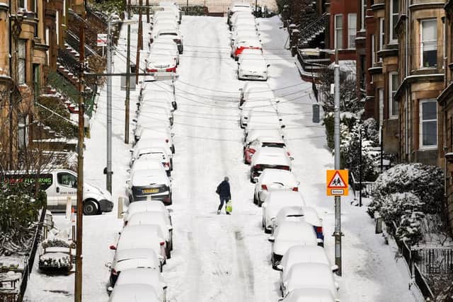 Members of the public make their way through the snow in Glasgow during the 'Beast from the East' in 2018 (Photo: Jeff J Mitchell/Getty Images)