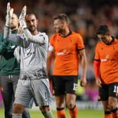 Dundee United goalkeeper Mark Birighitti applauds the fans at full time after the UEFA Europa Conference League third qualifying round first leg win over AZ Alkmaar at Tannadice. Pic: Andrew Milligan/PA Wire.