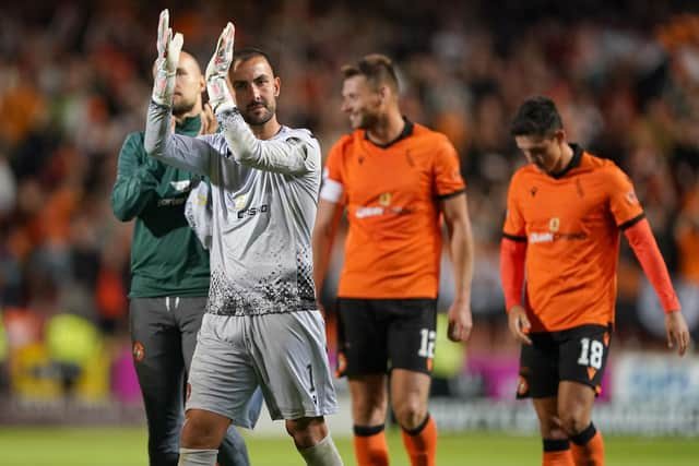 Dundee United goalkeeper Mark Birighitti applauds the fans at full time after the UEFA Europa Conference League third qualifying round first leg win over AZ Alkmaar at Tannadice. Pic: Andrew Milligan/PA Wire.