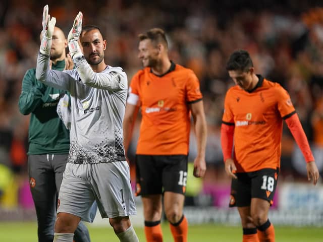 Dundee United goalkeeper Mark Birighitti applauds the fans at full time after the UEFA Europa Conference League third qualifying round first leg win over AZ Alkmaar at Tannadice. Pic: Andrew Milligan/PA Wire.