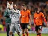 Dundee United goalkeeper Mark Birighitti applauds the fans at full time after the UEFA Europa Conference League third qualifying round first leg win over AZ Alkmaar at Tannadice. Pic: Andrew Milligan/PA Wire.
