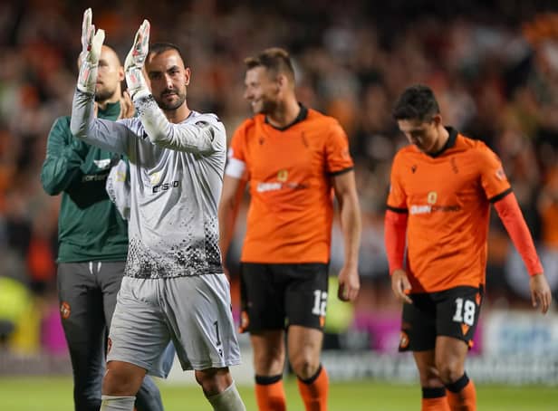 Dundee United goalkeeper Mark Birighitti applauds the fans at full time after the UEFA Europa Conference League third qualifying round first leg win over AZ Alkmaar at Tannadice. Pic: Andrew Milligan/PA Wire.
