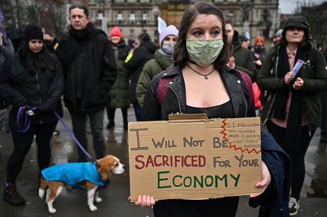 People protest in Glasgow's George Square against the rising cost of living earlier this year (Picture: Jeff J Mitchell/Getty Images)