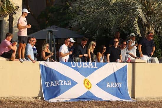 The Dubai Tartan Army supporting Bob MacIntyre at the side of the 17th hole. Picture: Andrew Redington/Getty Images.