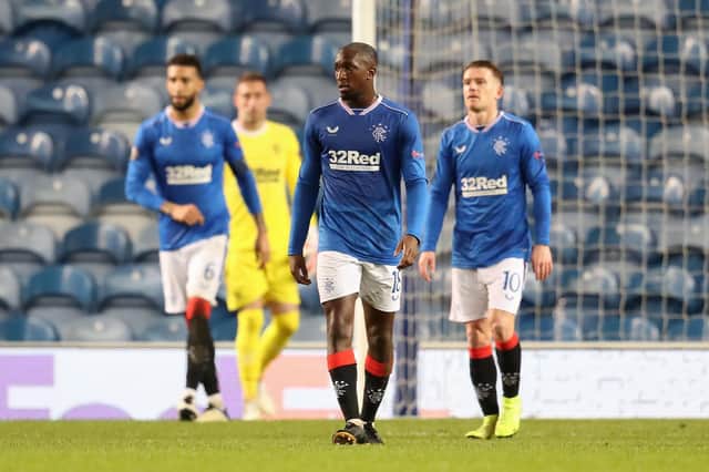 Glen Kamara of Rangers looks dejected after the second goal during the UEFA Europa League Round of 16 Second Leg match between Rangers and Slavia Praha at Ibrox Stadium on March 18, 2021 in Glasgow, Scotland. (Photo by Andrew Milligan - Pool/Getty Images)