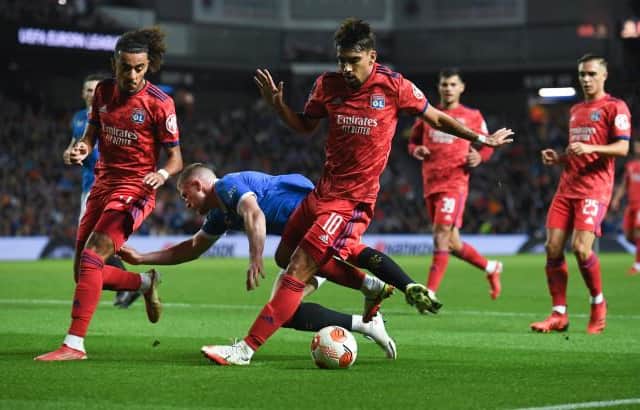 Rangers' John Lundstram goes down in the box under a challenge from Lyon's Lucas Paqueta during a UEFA Europa League group stage match between Rangers and Lyon, on September 16, 2021, in Glasgow, Scotland. (Photo by Craig Foy / SNS Group)