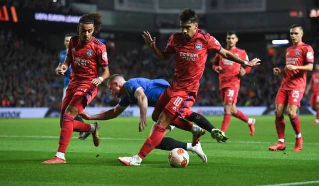 Rangers' John Lundstram goes down in the box under a challenge from Lyon's Lucas Paqueta during a UEFA Europa League group stage match between Rangers and Lyon, on September 16, 2021, in Glasgow, Scotland.  (Photo by Craig Foy / SNS Group)