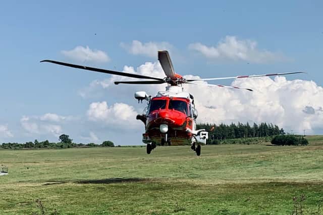 A coastguard helicopter attended the incident near Tinto Hill (Photo: Moffat Mountain Rescue Team).