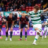 Jota puts Celtic in front from the penalty spot against Ross County.