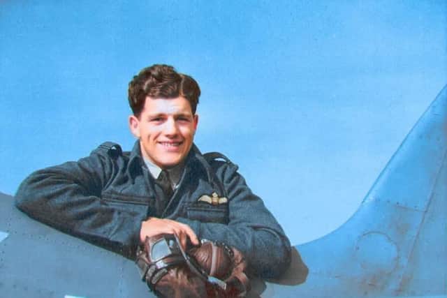 Alastair ‘Sandy’ Gunn leaning on the tail of Spitfire R7056 in November 1941. PIC: Gunn Family.