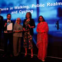 Council strategy team leader Chris Menzies (second left) and ISC vice-chair Cllr Isobel Davidson (centre) collect the award for the Aberdeenshire Bothy project.