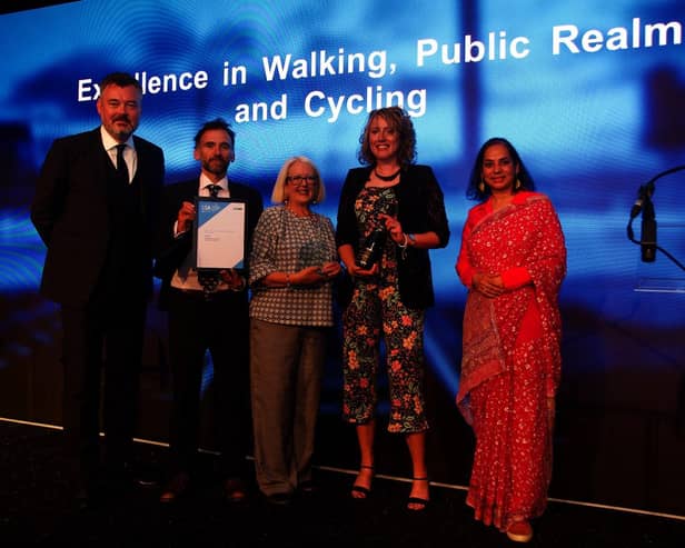Council strategy team leader Chris Menzies (second left) and ISC vice-chair Cllr Isobel Davidson (centre) collect the award for the Aberdeenshire Bothy project.