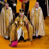 King Charles III receives The St Edward's Crown during his coronation ceremony in Westminster Abbey, London.