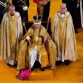 King Charles III receives The St Edward's Crown during his coronation ceremony in Westminster Abbey, London.
