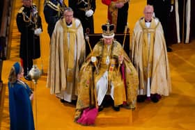 King Charles III receives The St Edward's Crown during his coronation ceremony in Westminster Abbey, London.