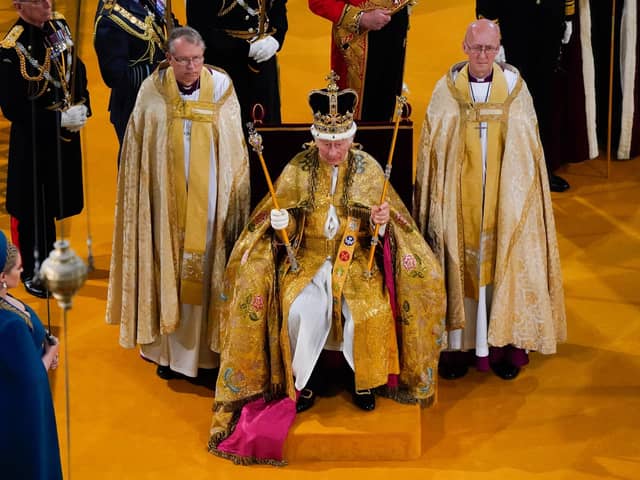 King Charles III receives The St Edward's Crown during his coronation ceremony in Westminster Abbey, London.