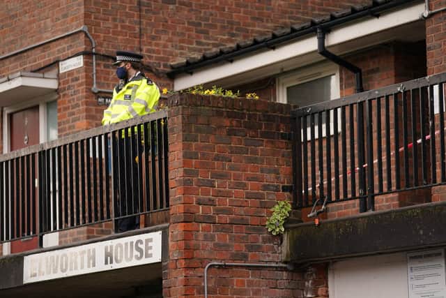 Police at the scene in Oval Place, Lambeth, south London, where a 16-year-old boy died after being stabbed on Monday evening. Picture date: Tuesday July 6, 2021. PA Photo. See PA story POLICE Stabbings. Photo credit should read: Victoria Jones/PA Wire 

