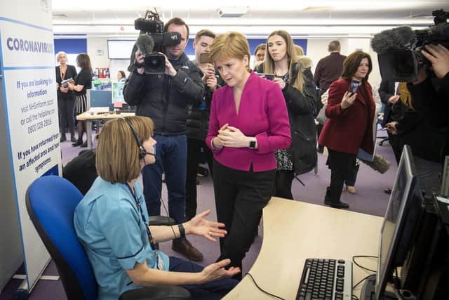 Scotland's First Minister Nicola Sturgeon said those with mild symptoms will be told to stay at home for a week.
