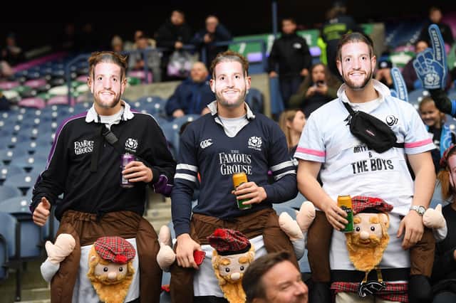 Some Scotland fans wore Finn Russell masks during the match against Fiji, such has been the clamour to have him back in the team.  (Photo by Ross Parker / SNS Group)