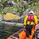 The experienced 72-year-old hillwalker being rescued by a lifeboat crew