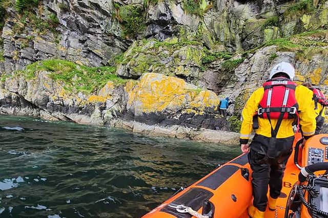 The experienced 72-year-old hillwalker being rescued by a lifeboat crew