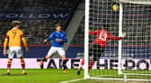 Cedric Itten scores in Rangers' 3-1 win over Motherwell at Ibrox in December - the Swiss striker has grabbed three goals in two appearances against the Fir Park club this season. (Photo by Rob Casey / SNS Group)