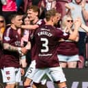 Barrie McKay, left, excelled as Hearts defeated Dundee 3-0 at Tynecastle.