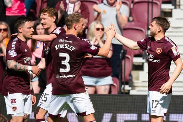 Barrie McKay, left, excelled as Hearts defeated Dundee 3-0 at Tynecastle.