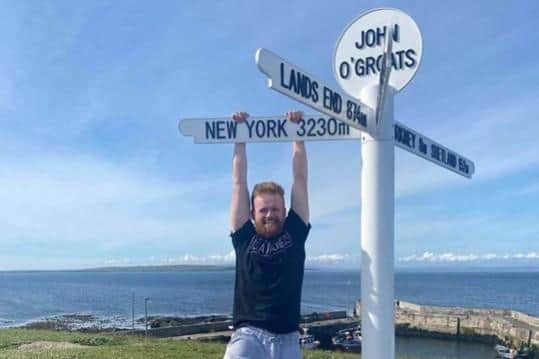 The John O'Groats Development Trust shared pictures of others swinging on the sign previously.