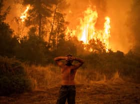 As wildfires and other symptoms of global warming become an increasing problem, the next international summit on the issue, COP28, will be run by an oil industry executive (Picture: Angelos Tzortzinis/AFP via Getty Images)