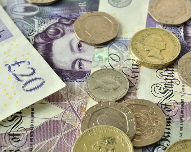 British currency, pound coins and banknotes. The UK's economic outlook is improving, but trade challenges remain.