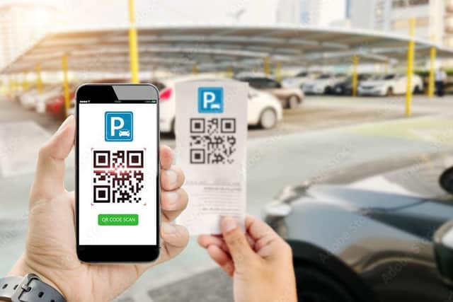 Crooks are replacing official private car park QR payment codes with ones putting your money into their bank accounts (Picture: Adobe)