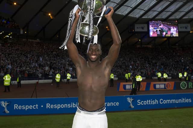Esmael Goncalves celebrates winning the League Cup with St Mirren in 2013.