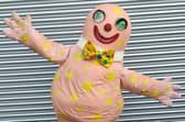 Complete with bow tie, toothy grin and green jiggling eyes, the 30-year-old costume was handmade for the BBC TV show Noel's House Party in the 1990s. Credit to eBay/mrwifey01