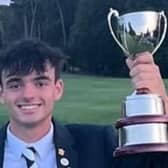 Bruntsfield Links teenager Aidan Lawson shows off the trophy after winning the European Young Masters in Slovakia.