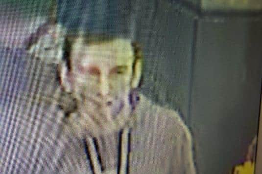 This man is being sought in connection with the assault. Picture: British Transport Police