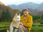 Hamish MacInnes with one of the Search and Rescue dogs at his home in Glencoe