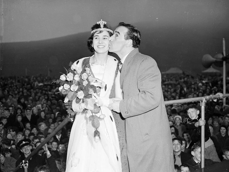 Larry Marshall kisses 'Coal Queen' Dorothy Jackson at Edinburgh's Miners' May Day Rally in 1958.
