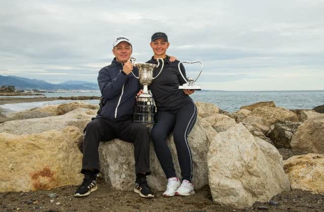 shows off her trophies with dad/caddie Jesper in Spain. Picture: Tristan Jones