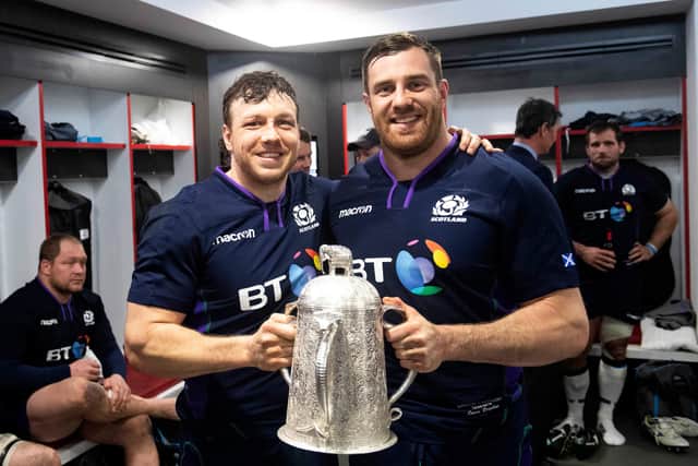 The 38-38 draw with England in 2019 saw Scotland retain the Calcutta Cup, Hamish Watson, left, with Simon Berghan in the Twickenham dressing room. Picture: Gary Hutchison/SNS