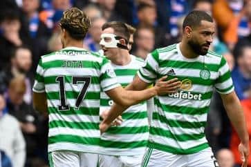 Celtic's Cameron Carter-Vickers and Jota celebrate at full time during a cinch Premiership match between Rangers and Celtic at Ibrox Stadium, on April 2, 2022.  (Photo by Rob Casey / SNS Group)