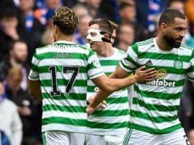 Celtic's Cameron Carter-Vickers and Jota celebrate at full time during a cinch Premiership match between Rangers and Celtic at Ibrox Stadium, on April 2, 2022.  (Photo by Rob Casey / SNS Group)