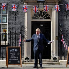 Boris Johnson speaks with stallholders during an event to promote British businesses at Downing Street yesterday (Picture: Toby Melville /WPA pool/Getty Images)
