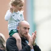 Hibs caretaker manager David Gray on the pitch with his daughter after the 4-0 win over St Johnstone. (Photo by Paul Devlin / SNS Group)