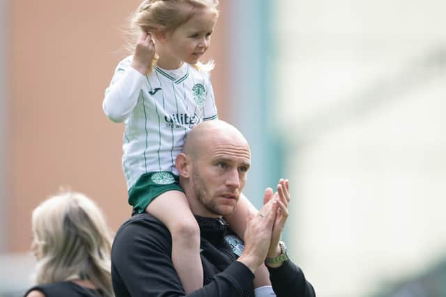 Hibs caretaker manager David Gray on the pitch with his daughter after the 4-0 win over St Johnstone. (Photo by Paul Devlin / SNS Group)