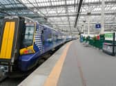 Rail services between Edinburgh and Glasgow Queen Street have been halted temporarily while engineers take control of two lines to fix a signalling fault.