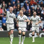 Dundee United's Craig Sibbald celebrates his goal to make it 2-1 to his side in front of dismayed Rangers supporters  (Photo by Alan Harvey / SNS Group)